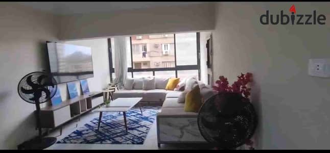 Furnished rental apartment in Mohandessin, Al-Rais Street, a very vibrant area