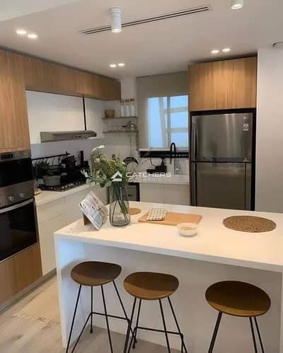 Apartment for sale, fully finished with air conditioning and kitchen units, in a very prime location in Heliopolis, next to City Centre Almaza