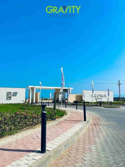 With a 10% discount and installments over 10 years, own a chalet in Aroma, Ain Sokhna, finished with air conditioning, kitchen, and natural gas, VIP finishing with the lowest down payment and longest repayment period - Aroma - Ain Sokhna - next to Azha
