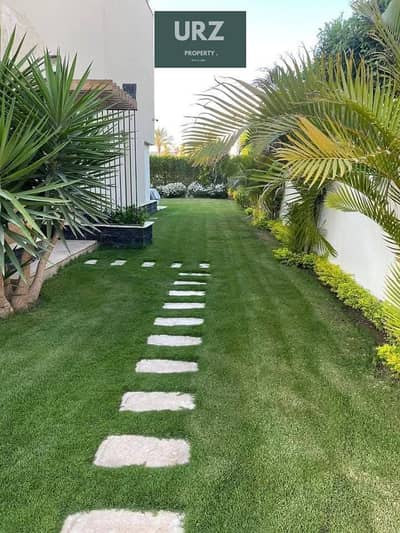 i villa with a garden and open view with installments up to 14% from Mountain View opposite Mivida Hyde Park minutes from Crescent Walk and Alcazar
