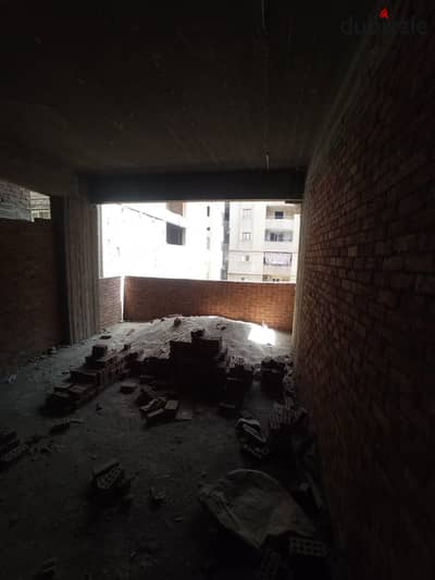 Apartment for sale, red brick, area of ​​150 m, undamaged facade, Zahraa Nasr City, Al-Ahaly Buildings