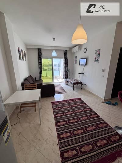 Fully furnished resale chalet at Aroma Ain Sokhna—priced below market rate Features a sea view and a prime location ready for viewing and immediate