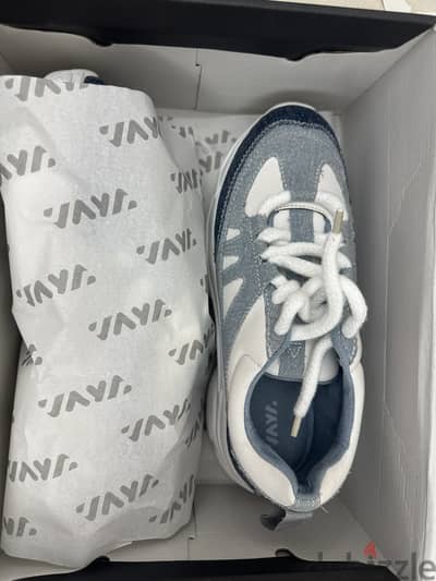 Blue and white sneaker