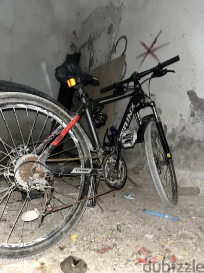 trinx m100 with bottle holder ,lock ,front and back sport fender