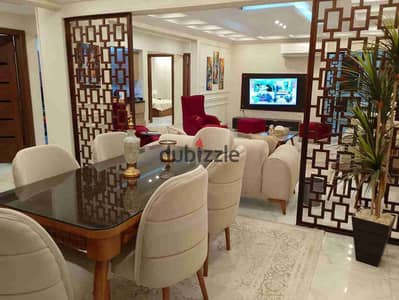 شقة فندقيه مفروشة تشطيب فندقي قرب فندق سفير ميدان المساحه للسكن الراقي بالدقي
