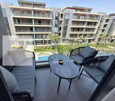 Ready-to-move apartment in Al Patio Oro compound, direct location on Mohamed Bin Zayed axis in New Cairo, reduced from its price by half