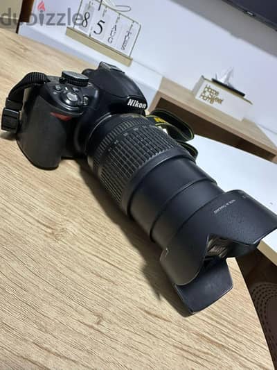 نيكون d3100 مع عدسه ١٨/١٠٥