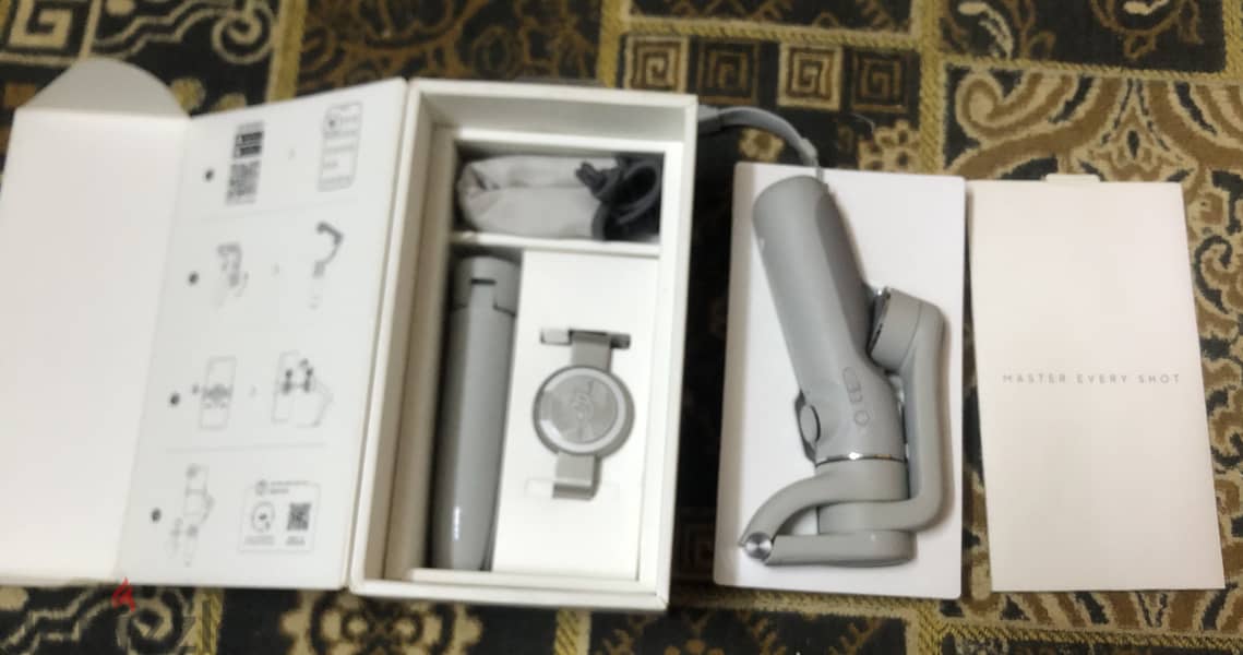 DJI OSMO 5 Smartphone Gimbal  Zero 1