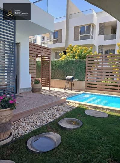 Apartment with garden for sale ready to move fully finished in New Cairo in front of Madinaty