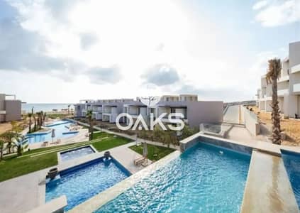 شالية للبيع متشطب 103م  من بالم هيلز قرية Hacienda Waters الساحل الشمالي  بالتقسيط علي 12 سنه