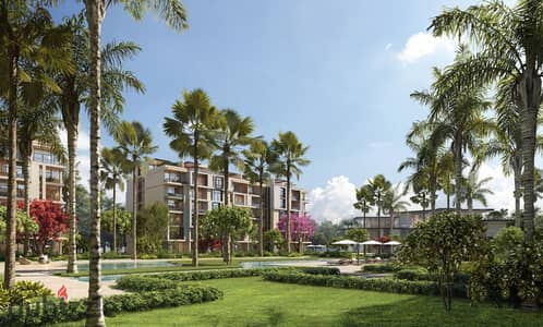 Fully finished apartment in a prime location next to Mall of Arabia, for sale with installments over 10 years