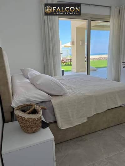شاليه 70م Fully Finished - خطوات من البحر + Lagoon view بمقدم 790الف + قسط 8 سنوات دقايق من هاسيندا الساحل و ماونتن فيو راس الحكمه seashore