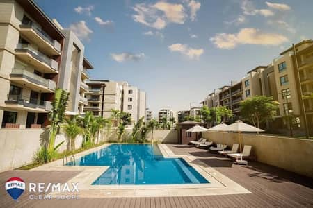بنص سعرها شقه متشطبة بالكامل بفيو pool في كمبوند ازاد التجمع الخامس بالقرب من الجامعة الامريكية