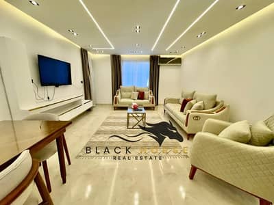 Furnished 2BR Ground Floor Apartment with Garden for Rent in Al Rehab – Special Finishes