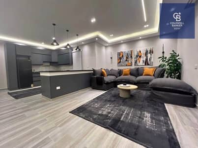 Immediate occupancy, fully modern 3-bedroom apartment with a sea view in a prime location in Sheraton Al-Gar Compound, available with installments.