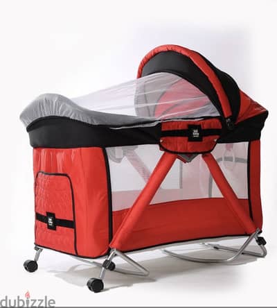 Red baby bed from uni baby in very good condition