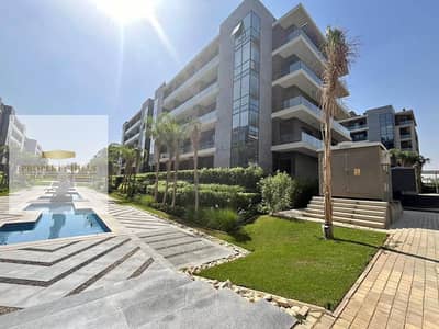 Apartment with a very special view in the patio Euro Prime location directly on Al-Zayed axis in the Fifth Settlement, down from its price and with a very big discount
