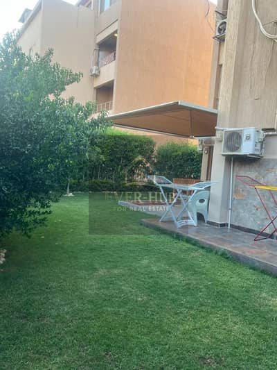 Ground floor apartment with garden for sale in Karma Residence compound, next to Mazar Mall. 3 bedrooms, 2 bathrooms, garden corner.