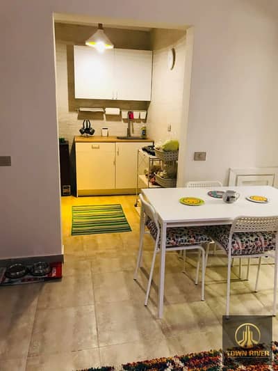 A distinctive chalet for sale in Piacera Village, Ain Sokhna. First floor, fully finished and furnished, directly overlooking the swimming pool. Immed