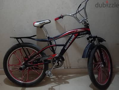عجلة BMX Amrecano مقاس 26 كبار (جنوط سبور - محتاجة تغيير أو لحام فرش)