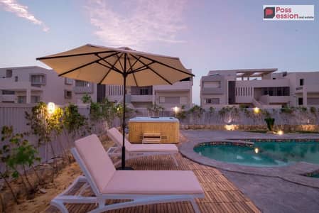 شالية sea view  للبيع متشطب بالتكيفات والمطبخ في هاسيندا الساحل الشمالي علر البحر