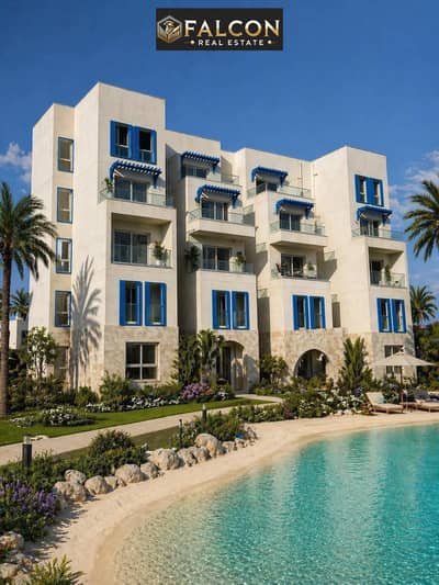 استلم فوري Sea View + لاجون شاليه 125م متشطب Luxury للبيع في نايا باي الساحل الشمالي بجوار فوكا راس الحكمة Naia Bay North Coast Ras ElHekma