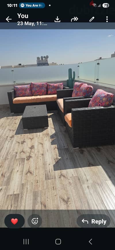 outdoor sofa and 2 chairs and table