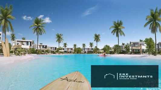 First row chalet overlooking the lagoon, ground floor with raised garden, for sale in installments in Azha Madar, North Coast - finished