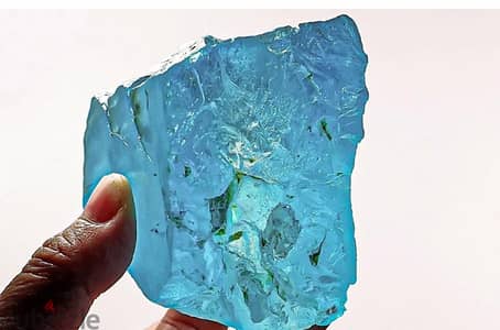 نصف كيلو توباز  برازيلي TOPAZ ازرق خام قطعه واحده VVS
