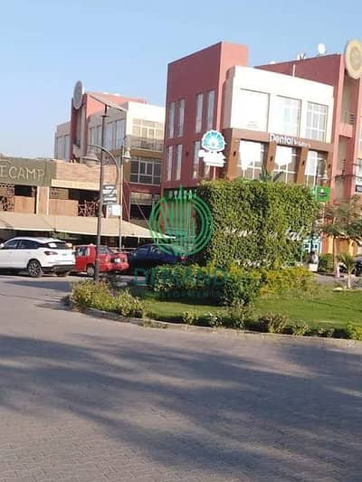 محل 60 متر متشطب بالتكييفات و الفرش و المعدات استلام فوري  في روضة زايد بمول المعز الحي ال 12 الشيخ زايد