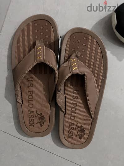 U. S. Polo Assn. tan flip-flops for men