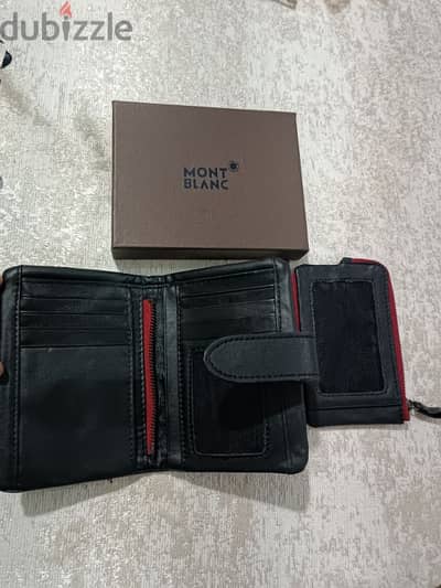 محفظة جلد طبيعي جديده بالعلبة versaceو montblanc
