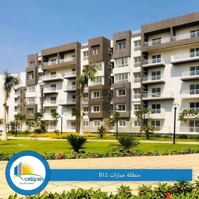 مدينتي شقه للبيع 107م اول سكن B12 فيو مفتوح علي شارع و جاردن بحري بسعر لقطه