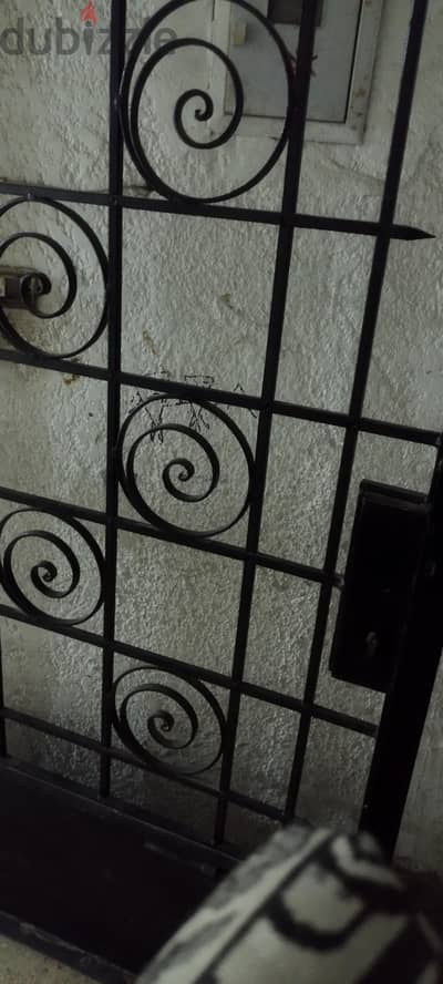 بوابه حديد٣ضلفه بالزجاج