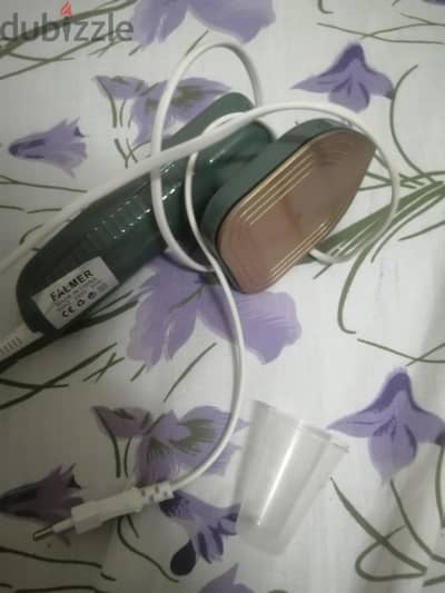 مكواه للملابس لسفر
