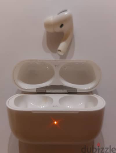 Original AirPods Pro (1st Generation) Right side with charging case