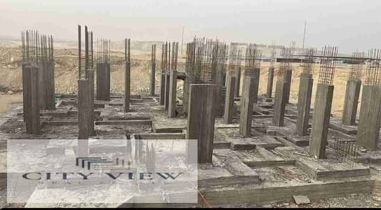 أرض للبيع خلف دريم لاند بجوار ماونتن فيو 1000م دبل فيس بأساسات ورخصة بناء