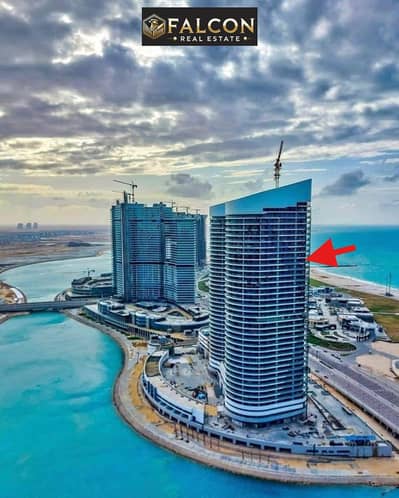 صف اول ع البحر دابل فيو البحر و لاجون ف قلب ابراج العلمين الشهيره - افضل استثمار في الساحل الشمالي