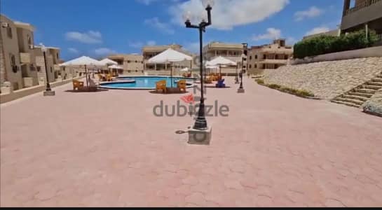 ارض للبيع في لاميرا الساحل الشمالي 380 متر علي شارع رئيسي ع pool