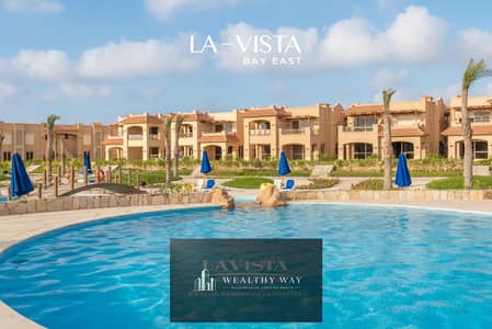 Chalet for sale with ultra-super-lux finishing, a distinctive view of the sea and pools in Lavista Bay East, in a prime location in Ras El Hekma, near