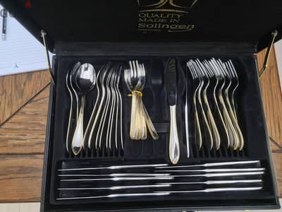 طقم معالق وشوك مطلي بالذهب ماركه سولينجن