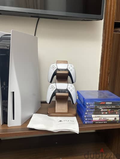 Ps5 disk edition+ 2 controllers+8 games+ huge account