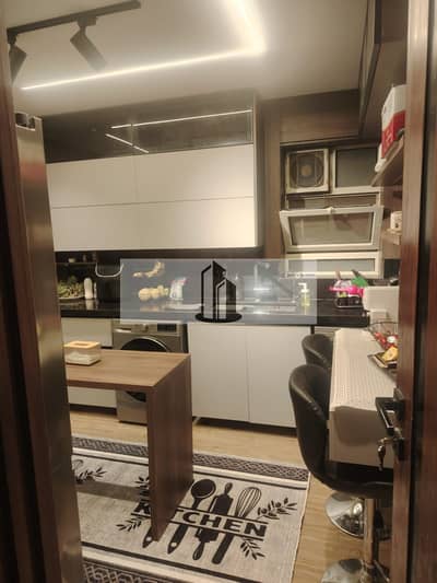 A fully finished, ready-to-move-in, furnished apartment is available for sale directly from the owner in Sarai Compound at a bargain price.