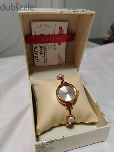 Raga titan watch rose gold ( new)