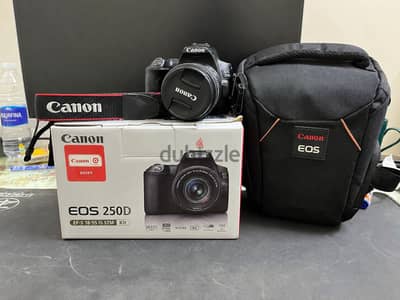 Canon 250D مع كل مشتملاتها