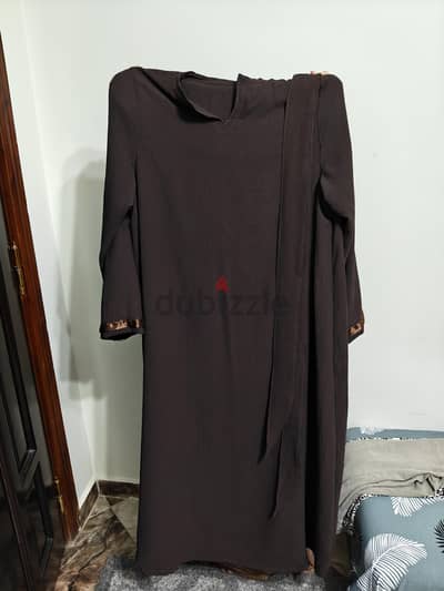 عباية او فستان