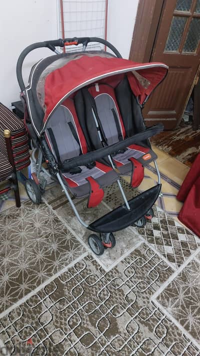 عربة اطفال جونيور توأم