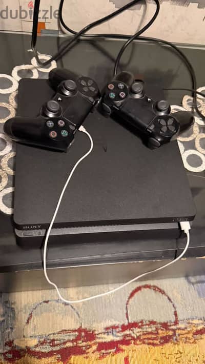 PS4 slim 500gb مع العاب و شنطه