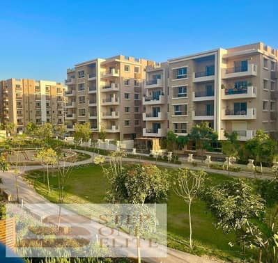 Two-bedroom apartment for sale at below market price in Taha City Compound, in the heart of New Cairo.