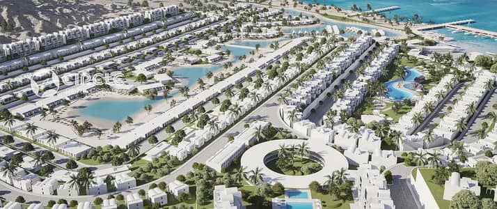 إطلالة على اللاجون والبحر شاليه ٩٥م للبيع في كمبوند سولت الساحل الشمالي Salt North Coast تطوير مصر
